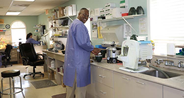 Professionally trained dental technicians at the on-site lab at Georgia Denture